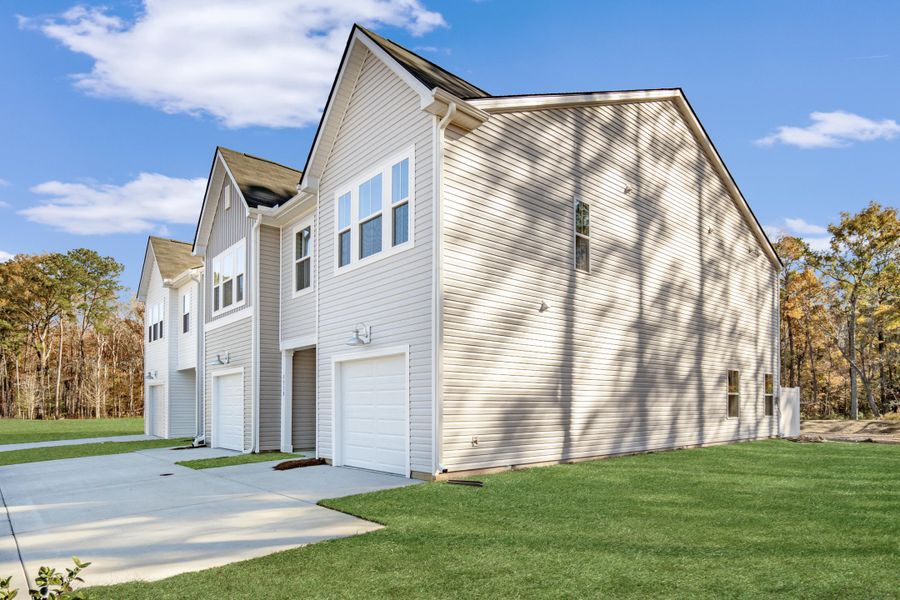 Front exterior of a new home in , Summerville, SC, highlighting curb appeal (Image 21). Front exterior of a new home in , Summerville, SC, highlighting curb appeal (Image 21).