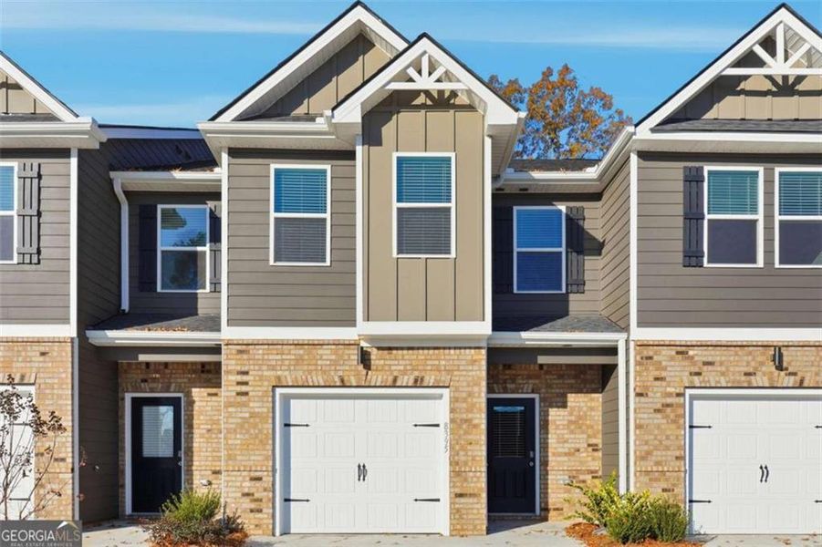 Front exterior of a new home in Carolina, Palmetto, GA, highlighting curb appeal (Image 11). Front exterior of a new home in Carolina, Palmetto, GA, highlighting curb appeal (Image 11).