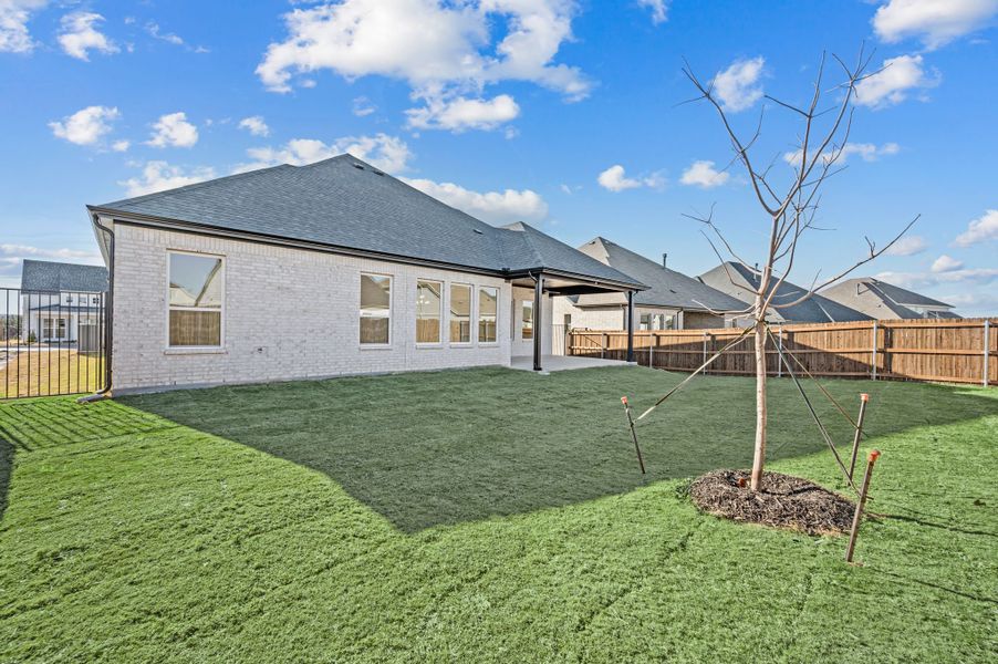 Exterior details and patio area of a home in Parks of Aledo, Aledo (Image 29).