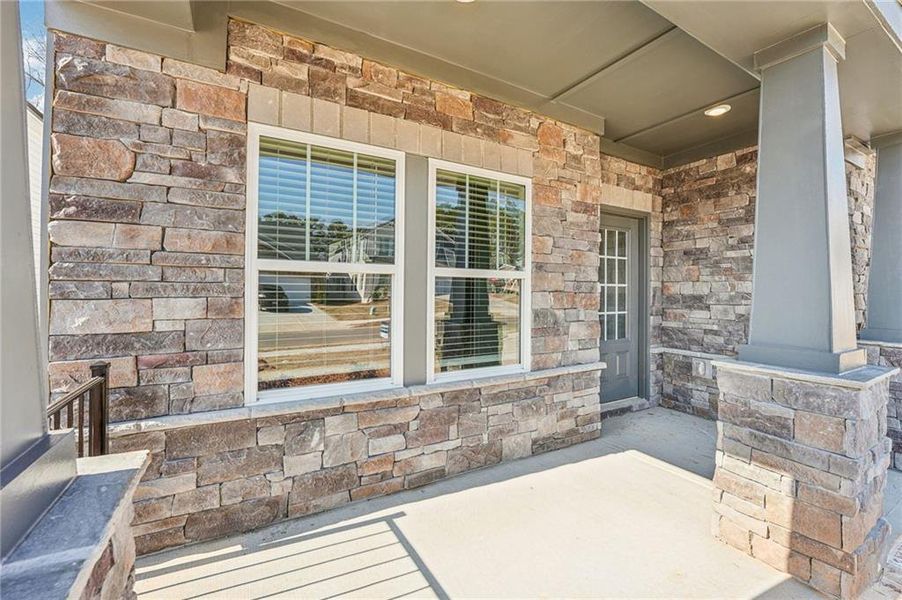 Exterior details and patio area of a home in Westmont Preserve, Powder Springs (Image 4).