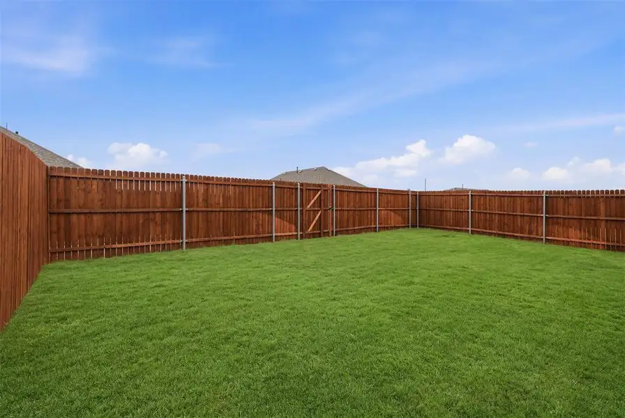 Exterior details and patio area of a home in Heartland, Heartland (Image 4).