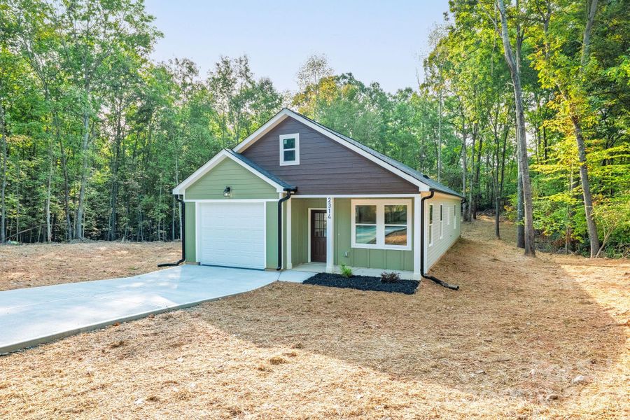 Front exterior of a new home in , Shelby, NC, highlighting curb appeal (Image 27). Front exterior of a new home in , Shelby, NC, highlighting curb appeal (Image 27).