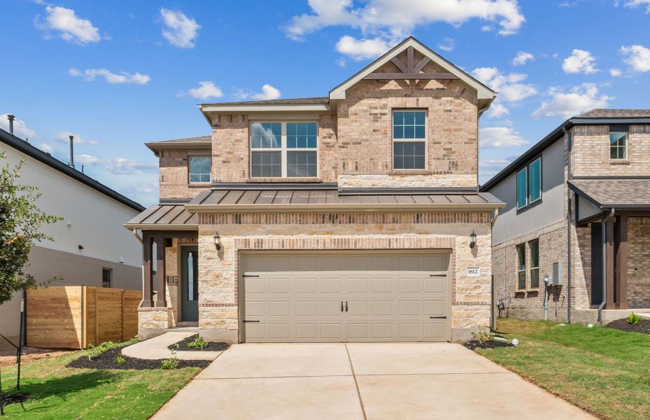 Front exterior of a new home in Wolf Ranch, Georgetown, TX, highlighting curb appeal (Image 17).
