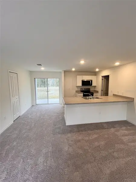 Spacious, unfurnished interior of a new home in Flagler Estates, Hastings (Image 5).
