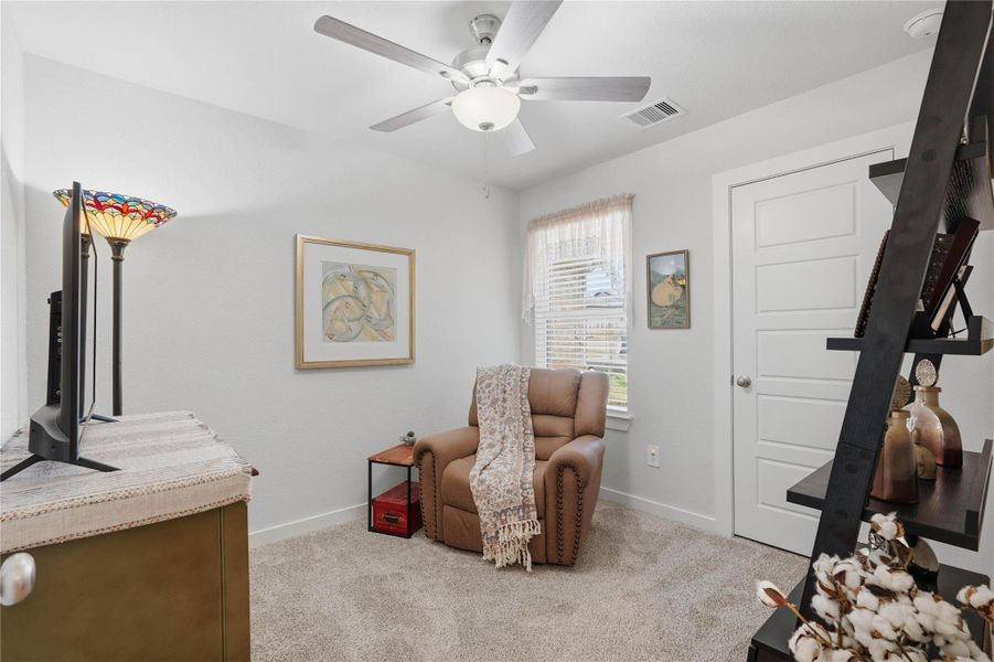 The third spare bedroom is roomy and bright. It makes an ideal space for a family media or game room.