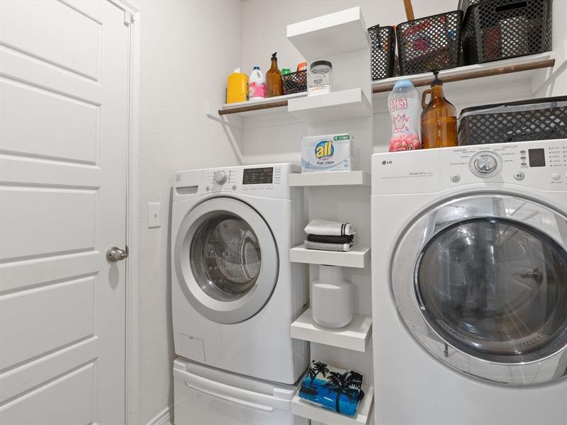 Laundry area featuring washer and clothes dryer