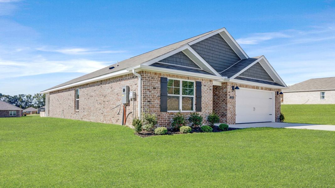 Front exterior of a new home in Bailey Park, Fayetteville, TN, highlighting curb appeal (Image 23). Front exterior of a new home in Bailey Park, Fayetteville, TN, highlighting curb appeal (Image 23).
