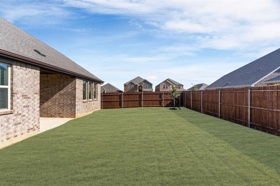 Exterior details and patio area of a home in , Aubrey (Image 4).