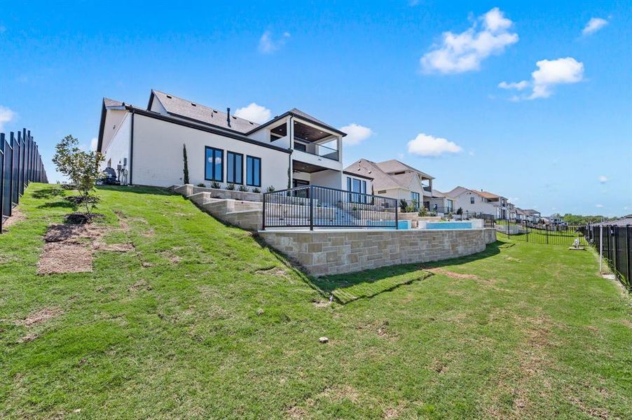 Exterior details and patio area of a home in The Resort on Eagle Mt. Lake, Fort Worth (Image 27).
