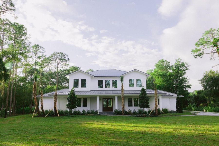 Front exterior of a new home in , Jupiter, FL, highlighting curb appeal (Image 3).