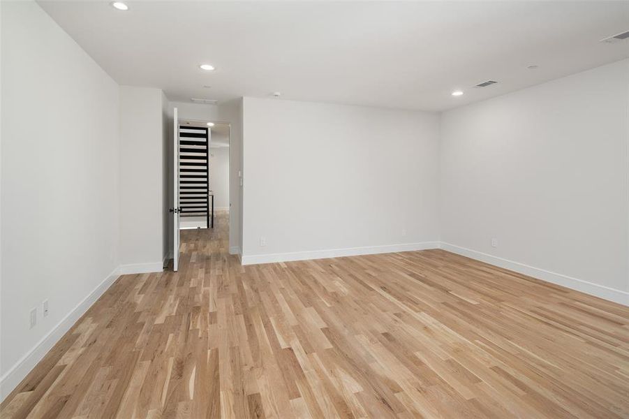 Spare room featuring light hardwood / wood-style floors