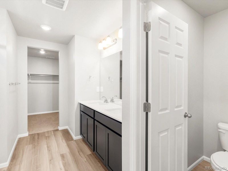 Furnished interior view inside a new home in Buffalo Highlands: The Flora Collection, Commerce City (Image 14).
