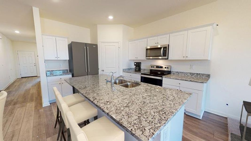Furnished interior view inside a new home in Rolling Glen, Hutto (Image 3).