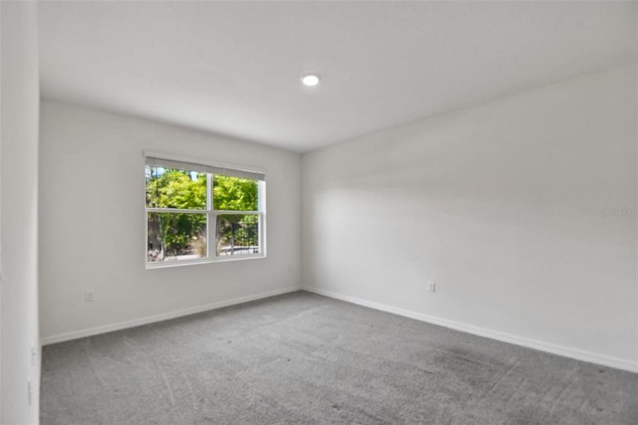 Spacious, unfurnished interior of a new home in Riviera Bella, Debary (Image 39).