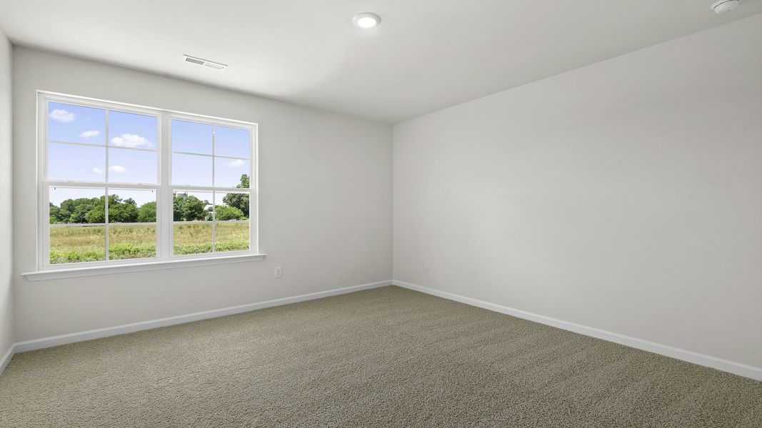 Spacious, unfurnished interior of a new home in The Landing at Summerhaven, Mebane (Image 13).