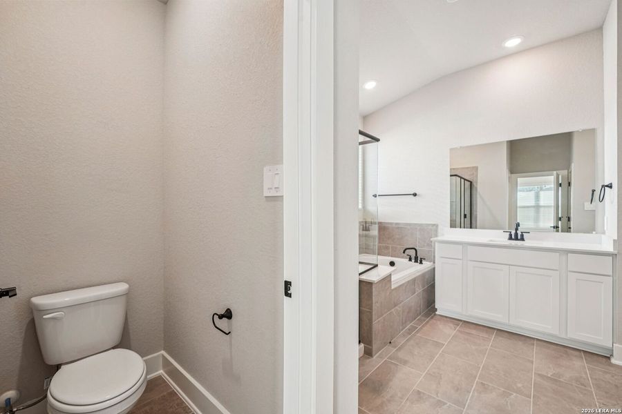 Furnished interior view inside a new home in Estancia Ranch - Classic Series, San Antonio (Image 6).