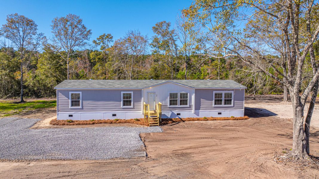 Exterior details and patio area of a home in , Pinopolis (Image 26).