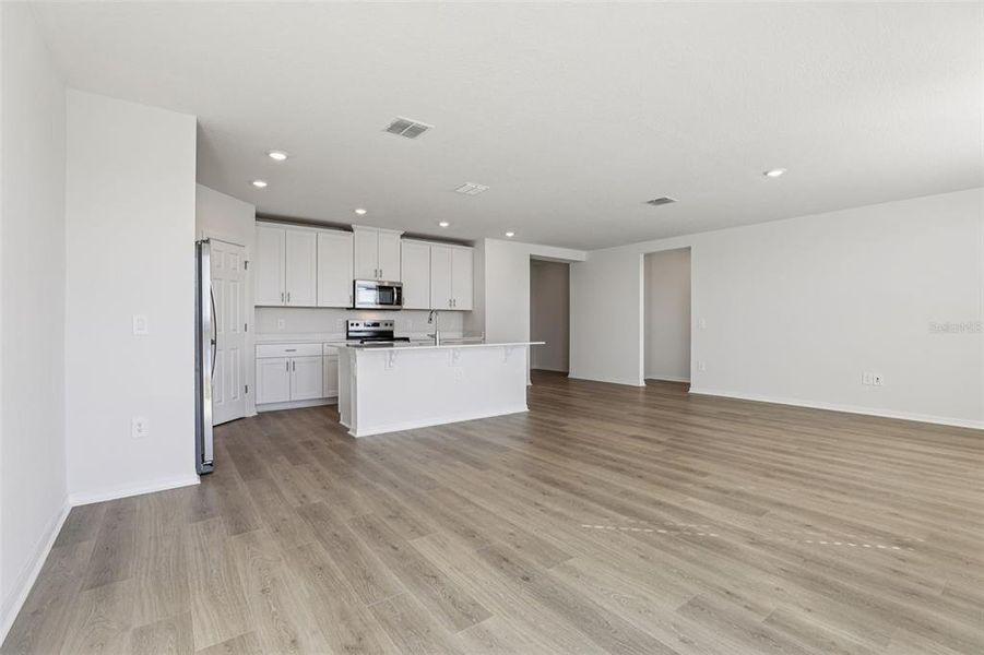 Spacious, unfurnished interior of a new home in Lake Deer Estates - Signature Series, Poinciana (Image 17).