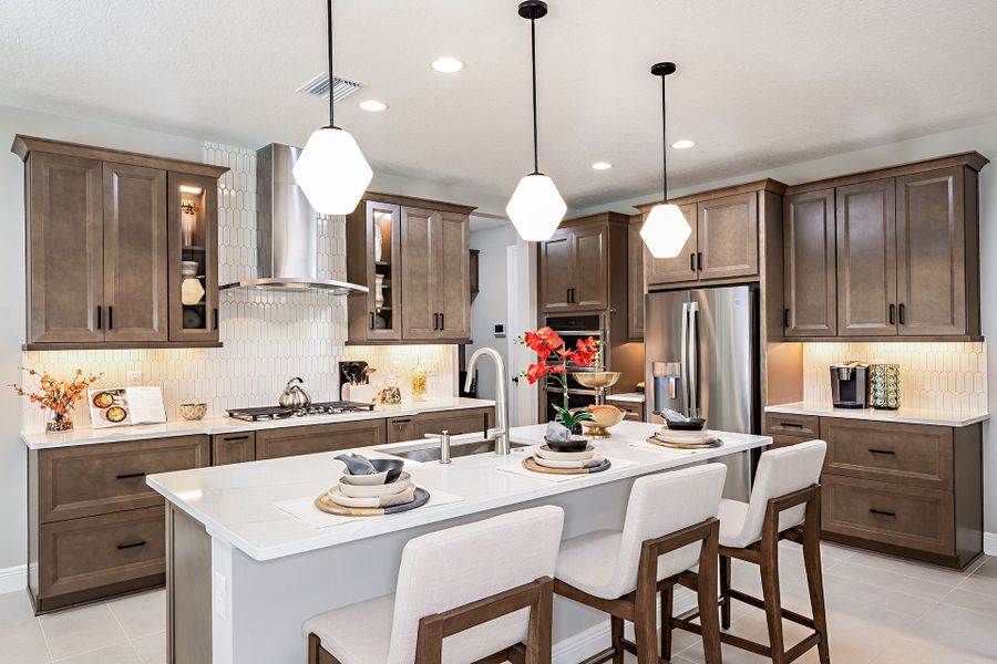 Representative furnished interior of a home built from the Pelican by Homes by WestBay in Crosswind Ranch, Parrish (Image 24).