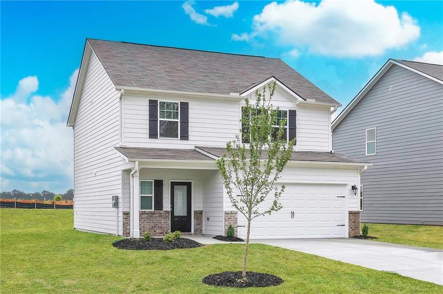 Front exterior of a new home in Lake Preserve at Jackson Trail, Jefferson, GA, highlighting curb appeal (Image 2).