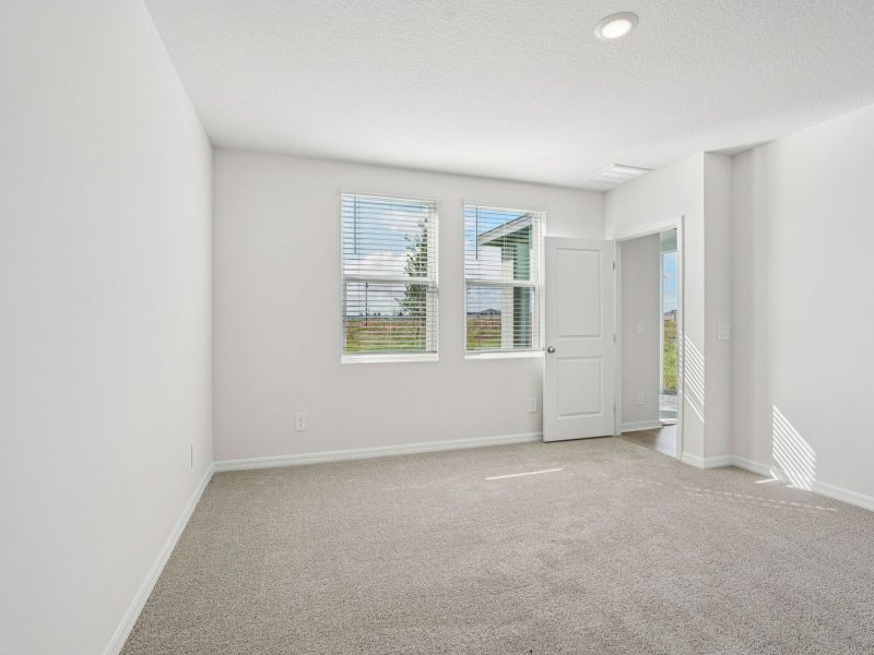 Spacious, unfurnished interior of a new home in Crosswinds - Classic Series, Haines City (Image 11).
