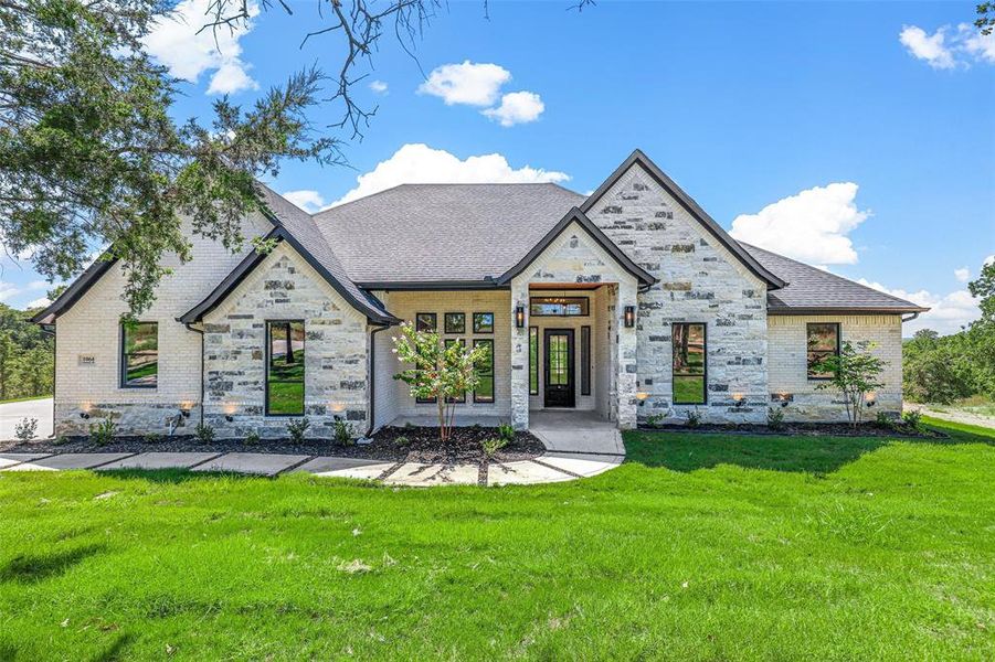 View of front of house featuring a front yard