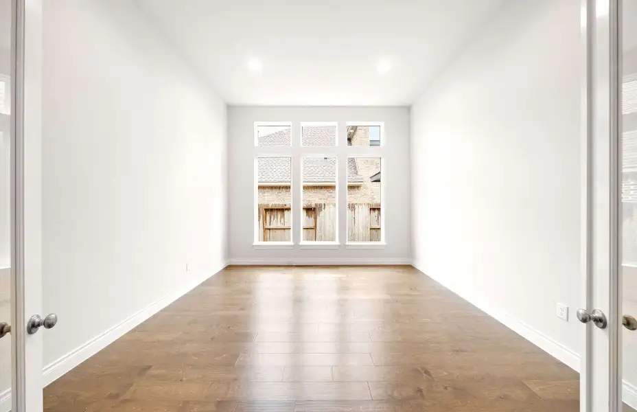 Representative unfurnished interior of a home built from the 3068 by Ravenna Homes in The Woodlands Hills 65′, Willis (Image 22).