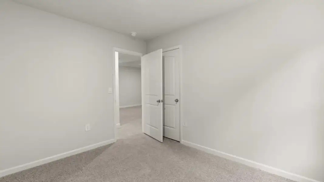 Spacious, unfurnished interior of a new home in Waypoint, Flowery Branch (Image 22).