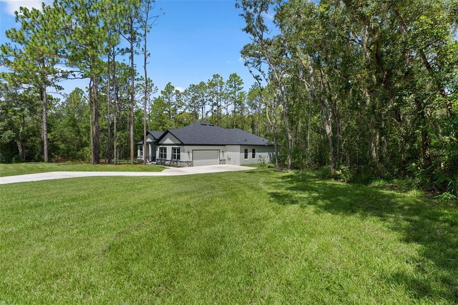 Front exterior of a new home in , Hernando, FL, highlighting curb appeal (Image 28). Front exterior of a new home in , Hernando, FL, highlighting curb appeal (Image 28).