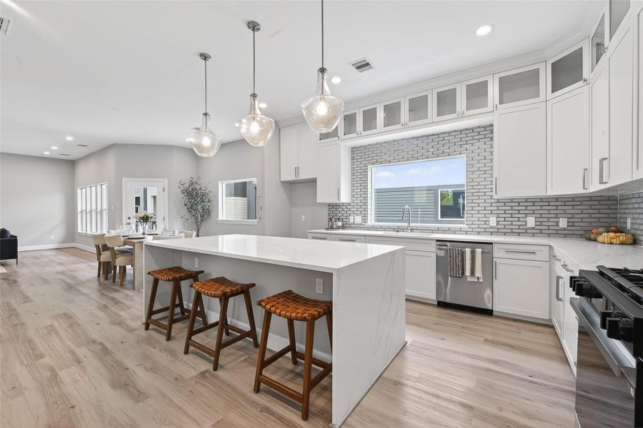 Island doubles as a breakfast bar Island doubles as a breakfast bar