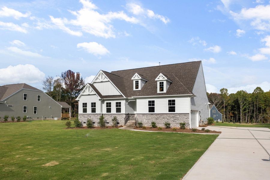 Front exterior of a new home in Redland, Advance, NC, highlighting curb appeal (Image 22).