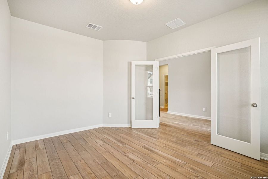 Spacious, unfurnished interior of a new home in Estancia Ranch - Classic Series, San Antonio (Image 37).