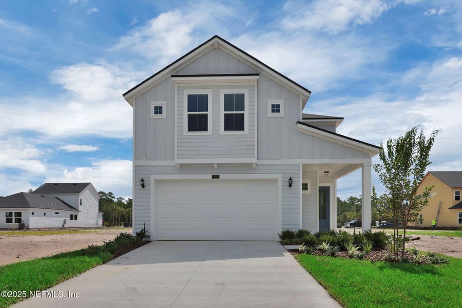 Front exterior of a new home in Seabrook Village at Nocatee, Ponte Vedra, FL, highlighting curb appeal (Image 20). Front exterior of a new home in Seabrook Village at Nocatee, Ponte Vedra, FL, highlighting curb appeal (Image 20).