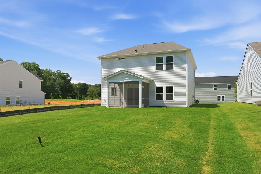 Exterior details and patio area of a home in Piper Creek, Newton (Image 28).