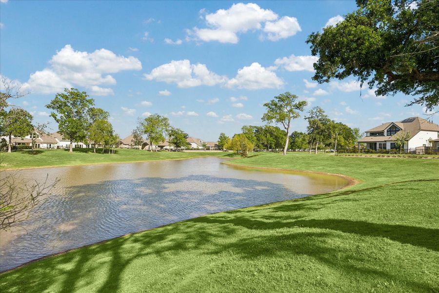 Expansive water views and rolling green space create a peaceful, park like setting just beyond the backyard. Mature trees and open sky give the entire area a calm, retreat feel. Expansive water views and rolling green space create a peaceful, park like setting just beyond the backyard. Mature trees and open sky give the entire area a calm, retreat feel.