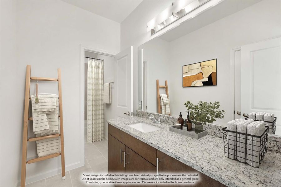 Bathroom with granite countertop vanity, dark wood cabinets, large mirror, and separate shower with curtain