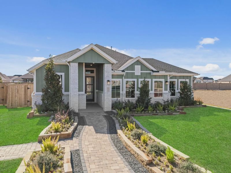 Representative exterior photo of a completed home built from the Aubrey by Chesmar Homes in Beacon Point, Texas City, TX (Image 25).