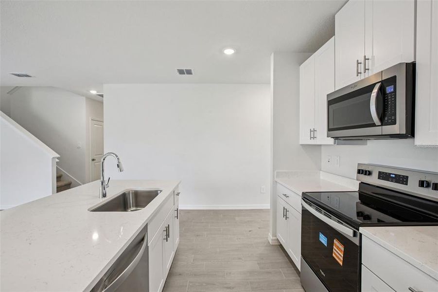 Furnished interior view inside a new home in Two Rivers - Classic Series, Zephyrhills (Image 12).