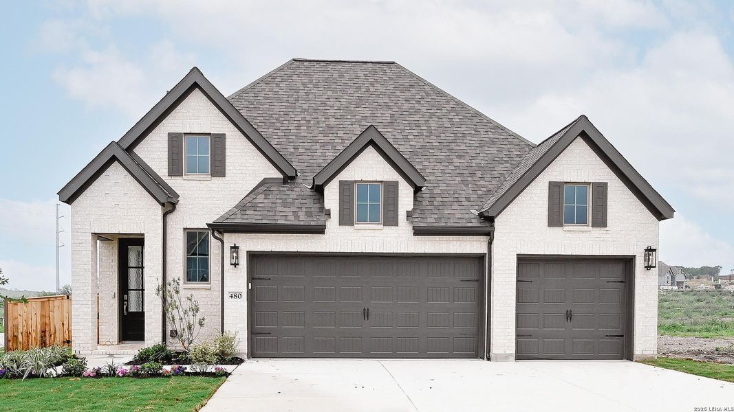 Front exterior of a new home in Mayfair, New Braunfels, TX, highlighting curb appeal (Image 2).