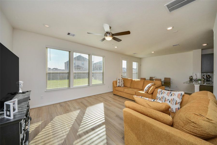 Furnished interior view inside a new home in Sunterra North, Katy (Image 32).