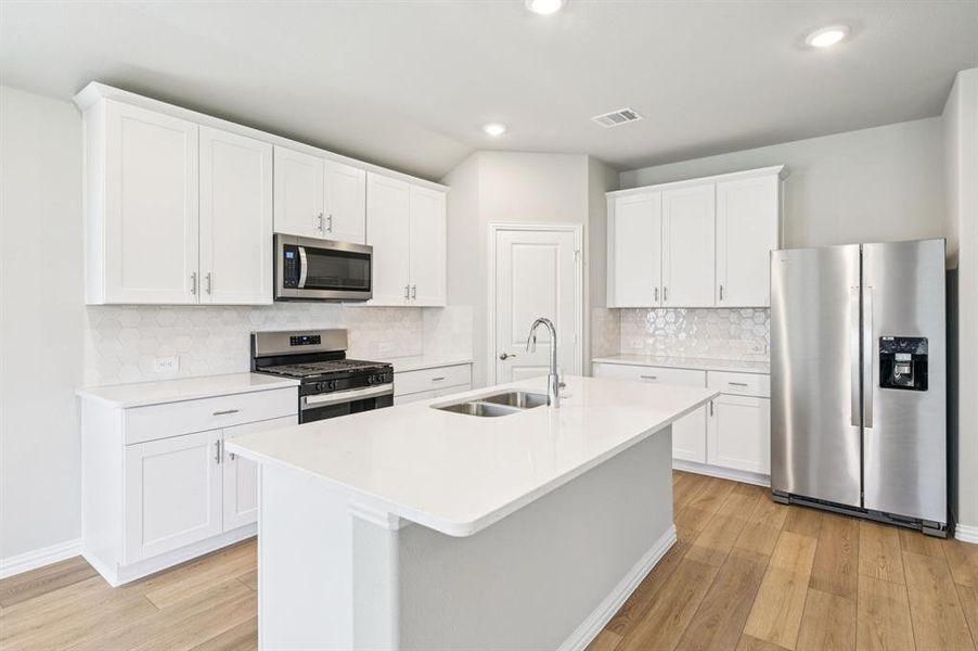 Photo is not of the actual home, but is an inspirational photo of builder’s model home and may depict options, furnishings, and/or decorator features that are not included.