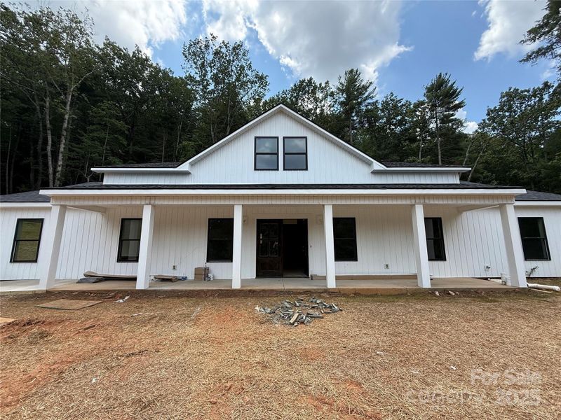 Front exterior of a new home in , Lenoir, NC, highlighting curb appeal (Image 7).