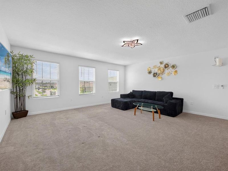 Furnished interior view inside a new home in Storey Creek, Kissimmee (Image 38).