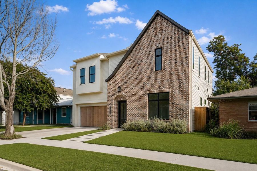 Front exterior of a new home in , Houston, TX, highlighting curb appeal (Image 1). Front exterior of a new home in , Houston, TX, highlighting curb appeal (Image 1).