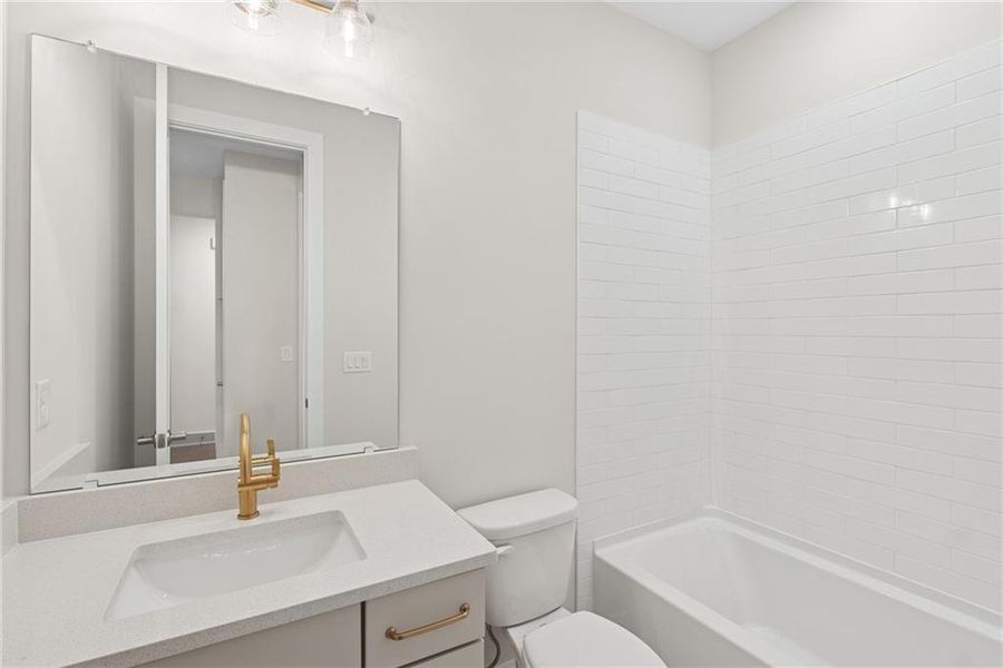 Furnished interior view inside a new home in Maple Grove at Towne Lake, Woodstock (Image 8).