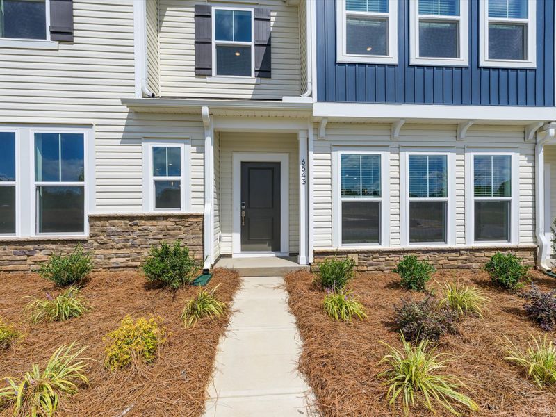 Exterior details and patio area of a home in Westwood Reserve, Charlotte (Image 4). Exterior details and patio area of a home in Westwood Reserve, Charlotte (Image 4).