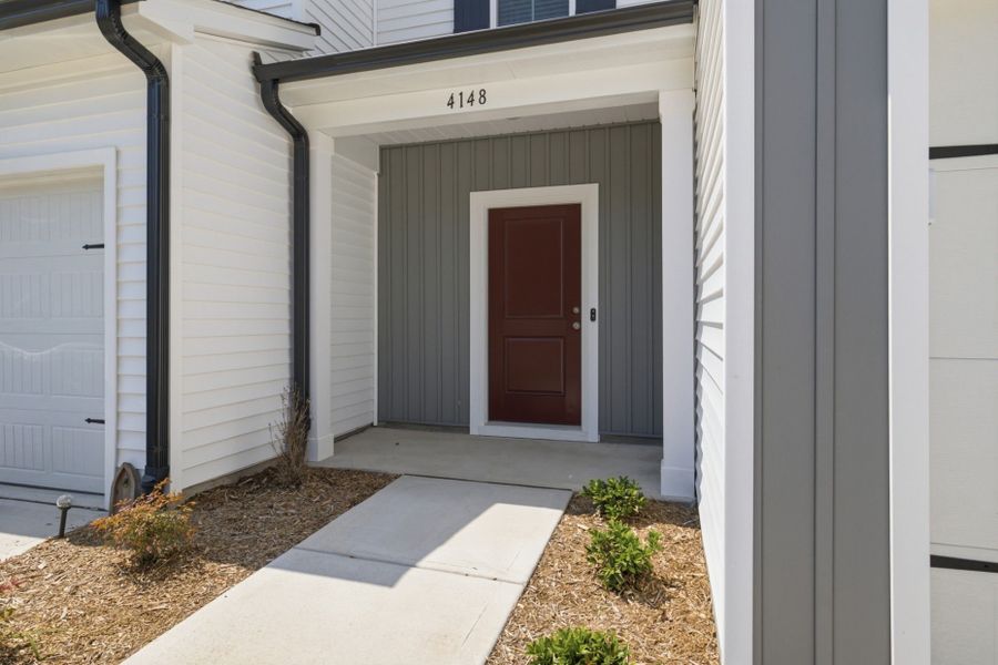 Exterior details and patio area of a home in Carpenter Falls, Durham (Image 33).