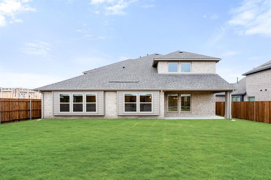 Exterior details and patio area of a home in Sonoma Verde, McLendon-Chisholm (Image 23).
