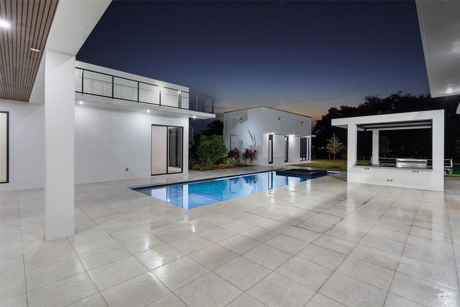 Exterior details and patio area of a home in , Parkland (Image 28).