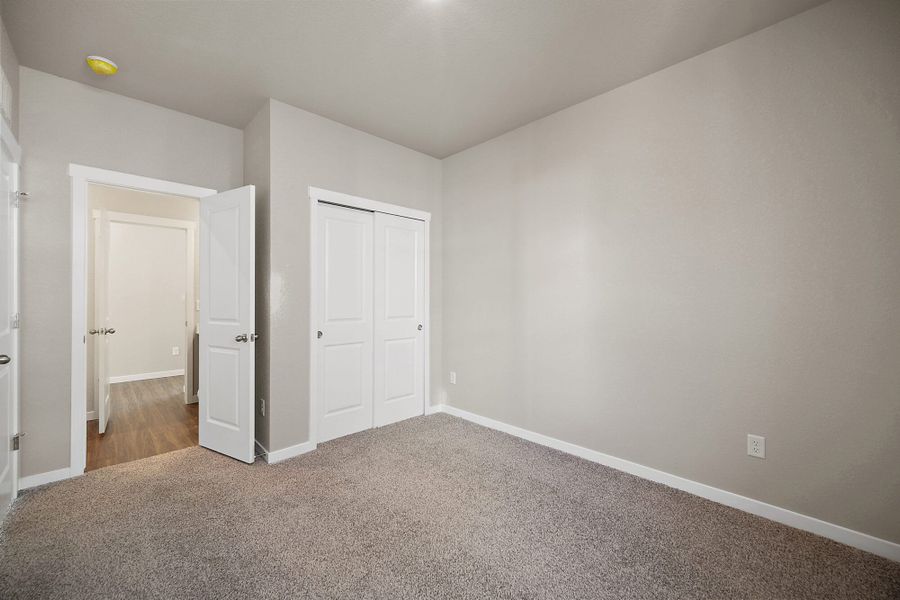 Spacious, unfurnished interior of a new home in Ridge at Lorson Ranch, Colorado Springs (Image 15).
